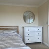 Photo 3: Solid wood bed, stylish chest of drawers and large mirror