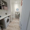 Photo 4: Utility room (washer drier)