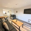 Photo 5: Large separate communal living space!