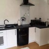 Photo 2: Kitchen area 