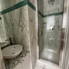 Photo 8: Ensuite shower room with shower, toilet, sink, towel rail (identical in both bedrooms)