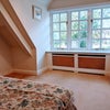 Photo 8: Bedroom with view of front