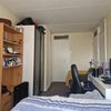 Photo 6: Bedroom 2: 1 closet, 1 wardrobe, chest of drawer, behind fire exit door: 1 closet + stairs