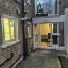 Photo 2: View of the flat from garden