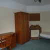 Photo 4: Bedroom 1 showing furniture