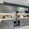 Photo 10: COMMUNAL KITCHEN