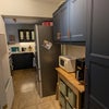 Photo 7: Microwave and storage