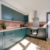 Photo 11: COMMUNAL KITCHEN