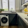 Photo 9: Kitchen - Bosch washer dryer and hot tap dispensing boiling water. 