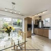 Photo 2: Bright Open plan kitchen 