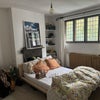 Photo 2: Available Bedroom. The bed and a small chest of drawers are included. All other furniture is going.