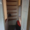 Photo 4: Storage cupboard via room