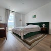 Photo 7: King Size Ensuite + Floor to Ceiling Wardrobe 