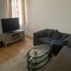 Photo 3: Spacious front room with sofa and tv