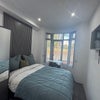 Photo 10: Bedroom 1