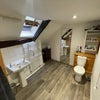 Photo 3: Shared bathroom with shower over bath