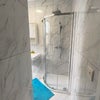 Photo 4: Shared shower/toilet