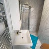 Photo 5: Shared shower/toilet