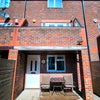 Photo 2: The room is on the ground floor overlooking the patio