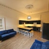 Photo 2: Kitchen Lounge
