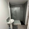 Photo 6: SHARED BATHROOM FLOOR BELOW FLAT