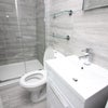 Photo 2: Shared Bathroom