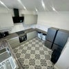 Photo 3: Modern kitchen area