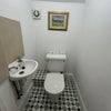 Photo 4: Private toilet (accessed from corridor adjacent to room)