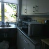 Photo 5: Utility, air fryer, microwave, fridge, hob