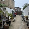 Photo 9: Shared communal garden and bike storage