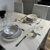 Photo 7: Dining space with seating for two, perfect for winding down after work