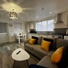 Photo 8: Open plan layout connecting the bedroom to the kitchen and living space
