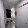 Photo 5: Entrance (with dartboard)