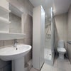 Photo 5: Bright, practical bathroom – spotless and ready to use