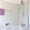 Photo 6: The shower and tub of the bathroom