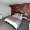 Photo 2: Furnishings include a double bed, wardrobe, chest of draws, bedside table, desk and chair.