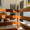 Photo 2: room and bathroom next to each other 