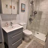Photo 5: Bathroom with power shower