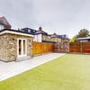 Photo 9: Spacious private garden with low-maintenance lawn and patio area – perfect for outdoor living and 