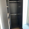 Photo 7: Wardrobe and shelving unit/bookcase