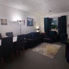 Photo 3: Living room - desk, large table, spacious sofas, recently renovated