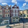 Photo 8: View from the window - Sainsbury's right across the street