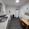 Photo 2: Kitchen area