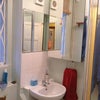 Photo 9: One of the Bathrooms
