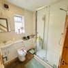 Photo 5: Modern, clean bathroom with some storage space for your bits & bobs