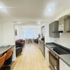 Photo 2: Communal kitchen and living room