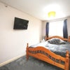Photo 1: This is the same room bed is in central place thats only difference 