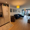 Photo 3: Our spacious kitchen/living area