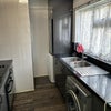 Photo 6: Updateed Kitchen area with dryer and washer