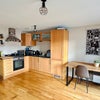 Photo 2: Open Pnan Kitchen/Livingroom